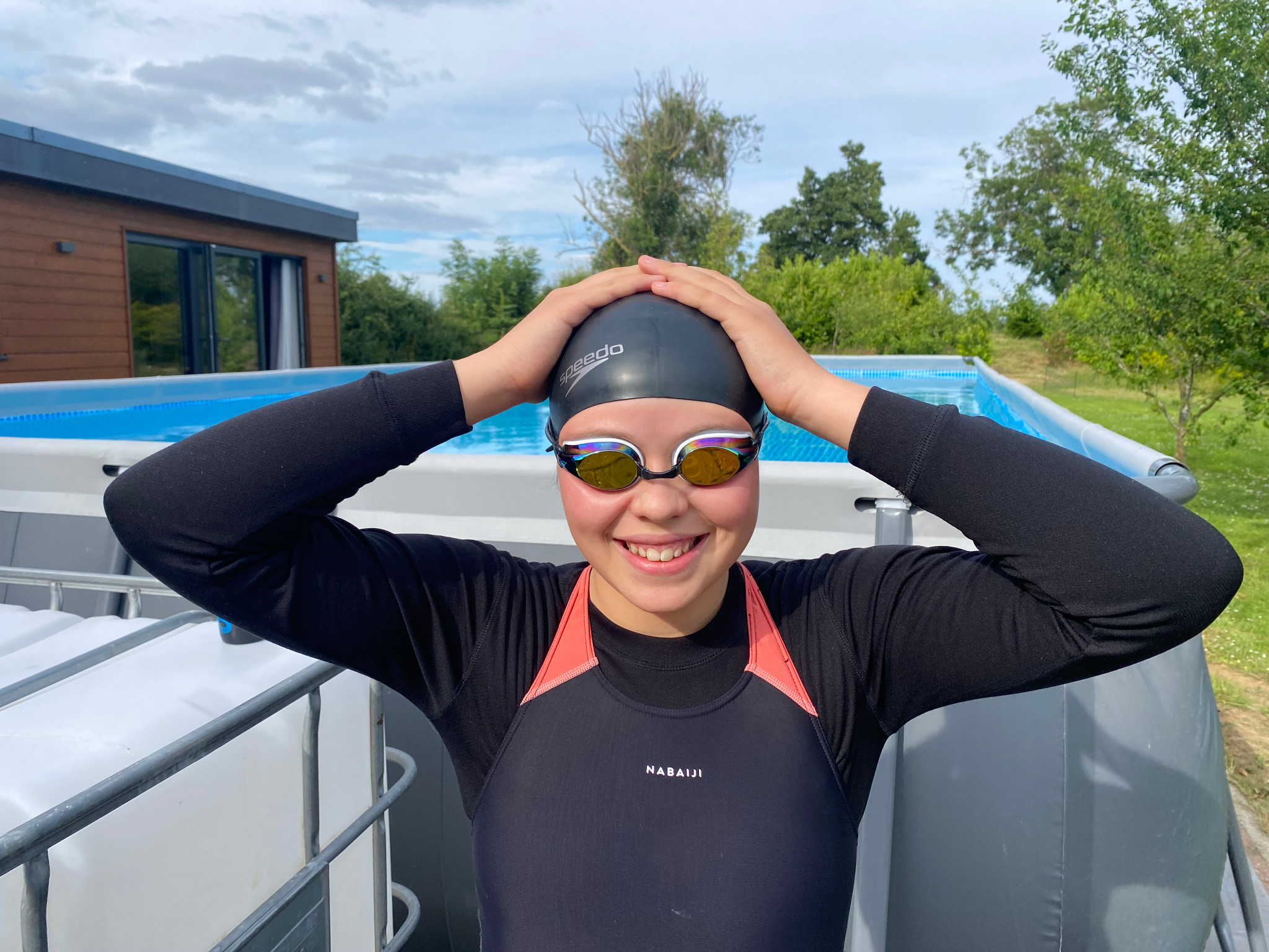 Suki Sowden stood beside the pool